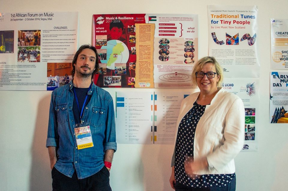 Alberto Balducci (PM) and Silja Fischer (IMC) with the M&R poster